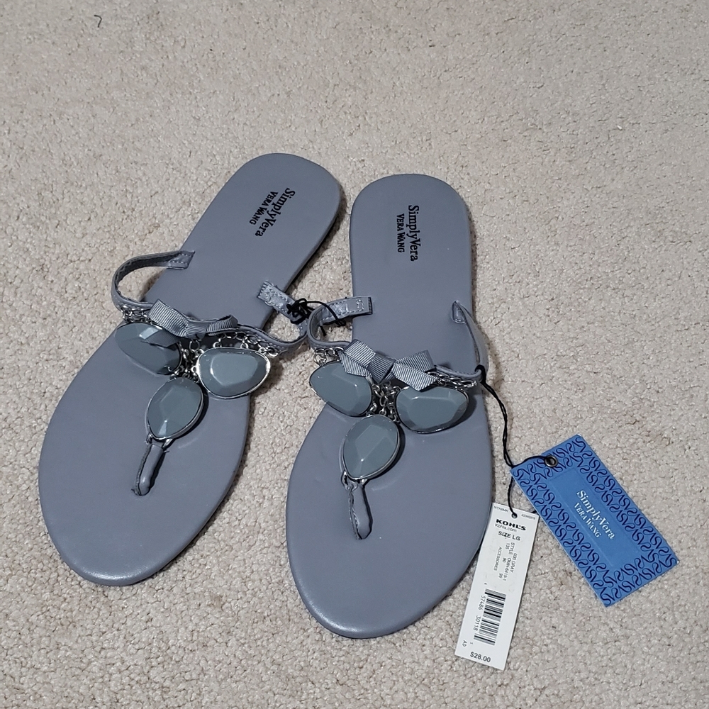 Simply Vera Vera Wang gray jeweled flip flops with bedazzled bow accents. 